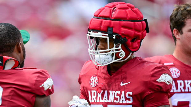 Razorbacks linebacker Chris "Pooh" Paul and Antonio Grier